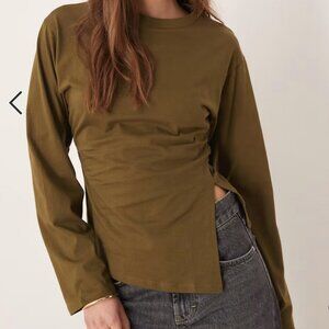 Asymmetric slit him tee